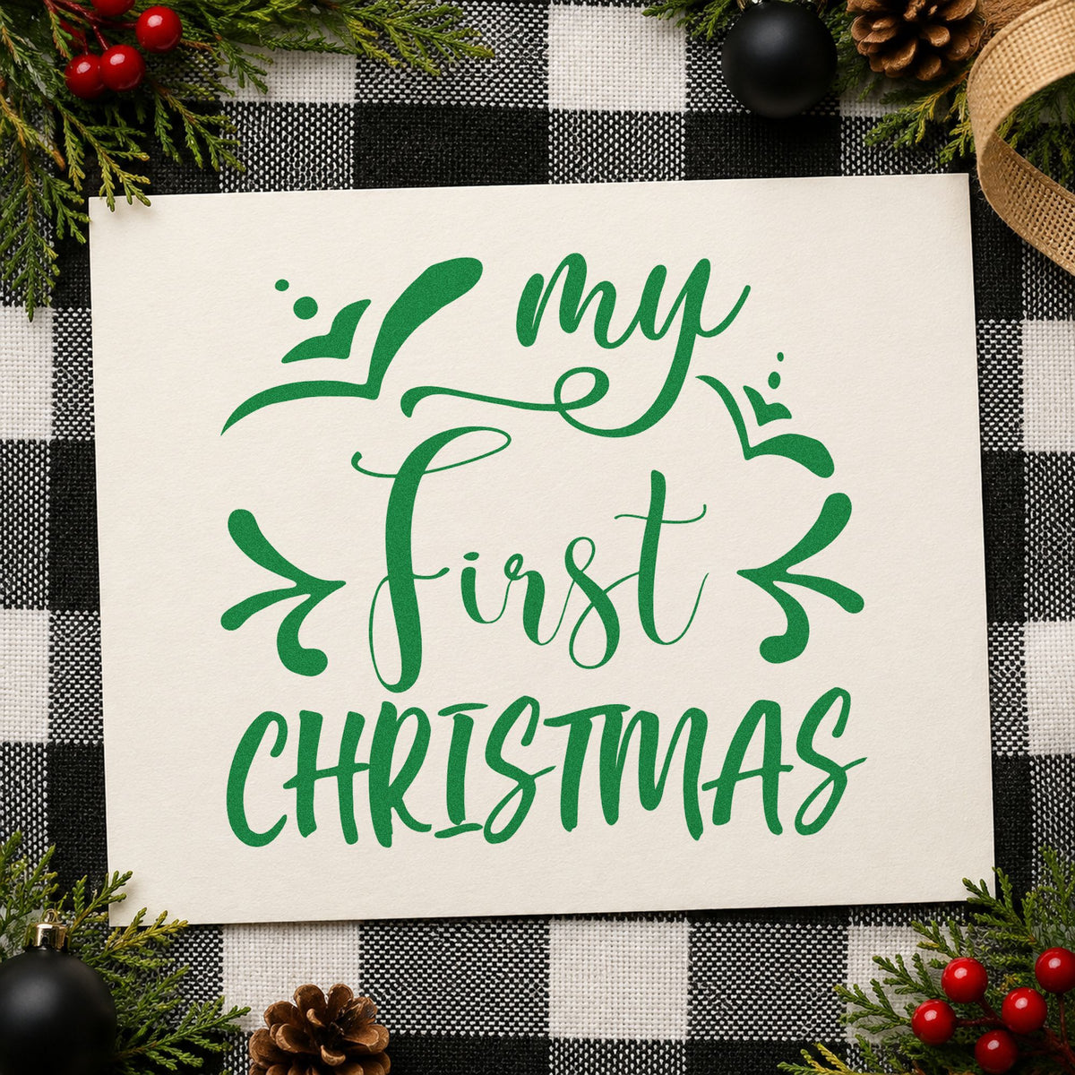 My First Christmas craft stamp imprint in green ink on a handmade project, one idea being announcement tags.