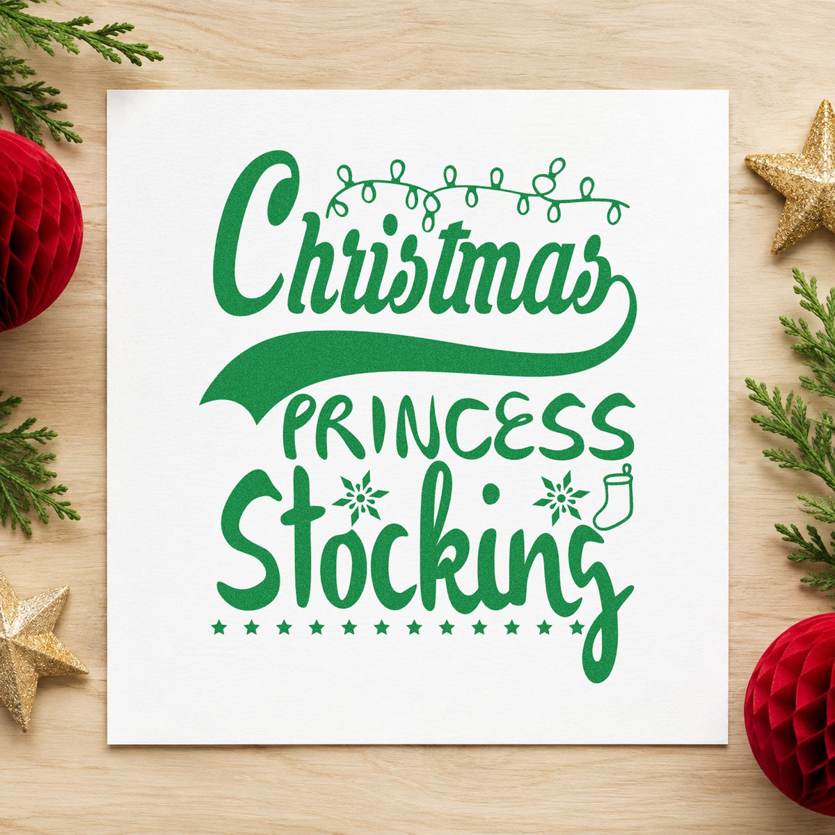 Christmas Princess Stocking craft stamp imprint in green ink on a handmade project, one idea being named cuff tags.