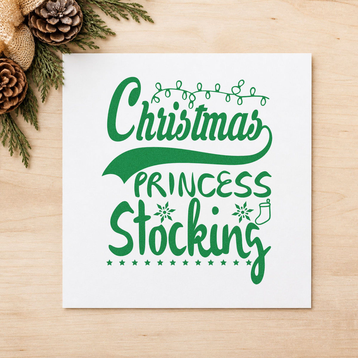 Christmas Princess Stocking craft stamp imprint in green ink on a handmade project, one idea being tea party placards.
