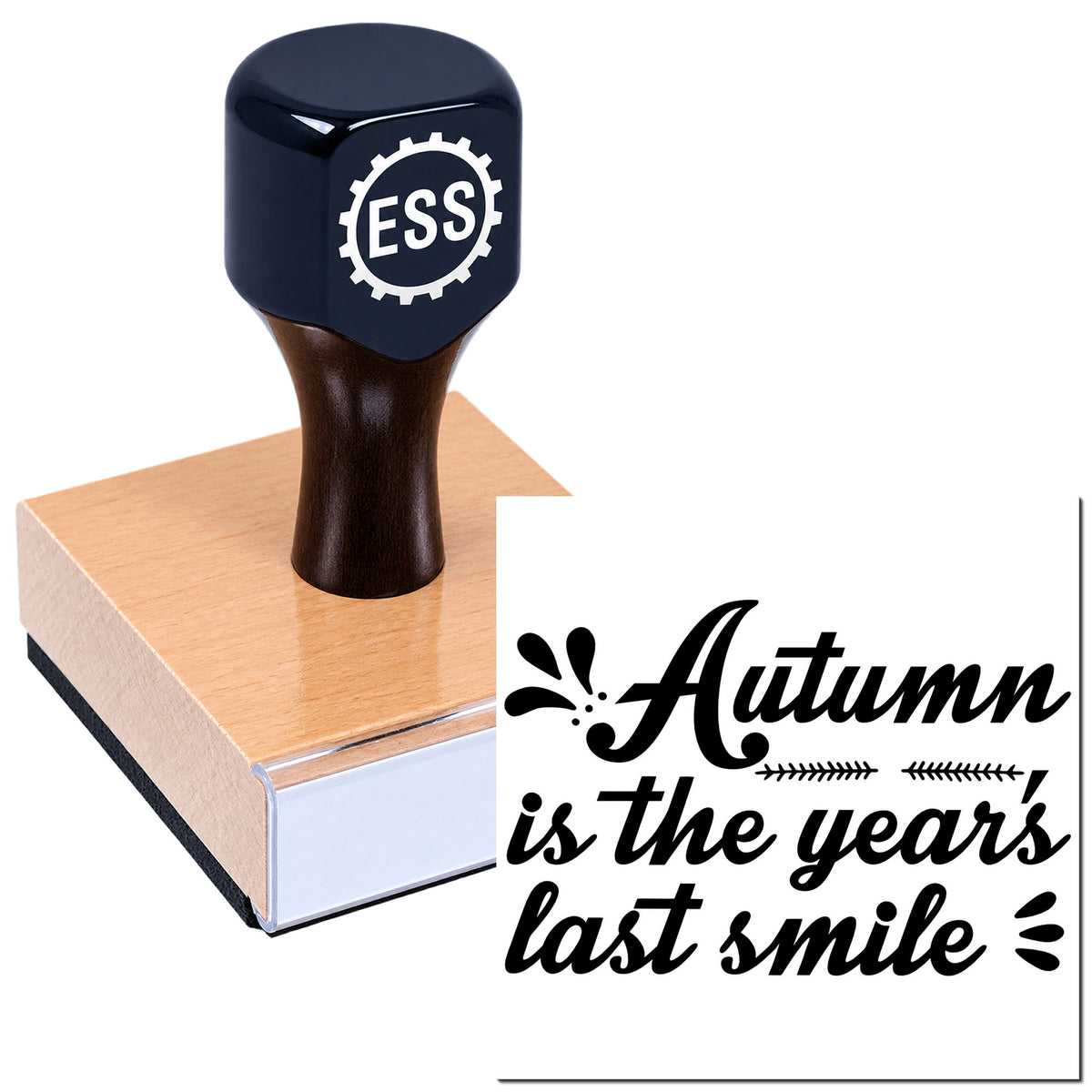 Dark navy self-inking stamp and seal with ESS logo on a wooden block, plus black "Autumn is the year's last smile" imprint.