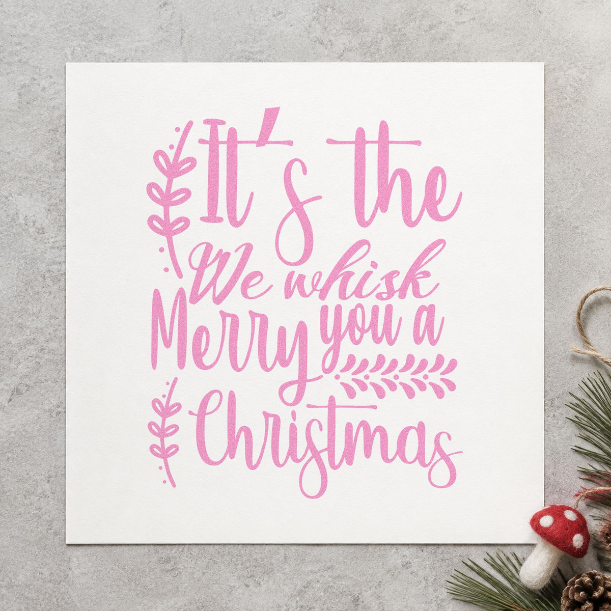 We Whisk Merry Christmas craft stamp in purple ink on cardstock, an easy option for recipe test album.