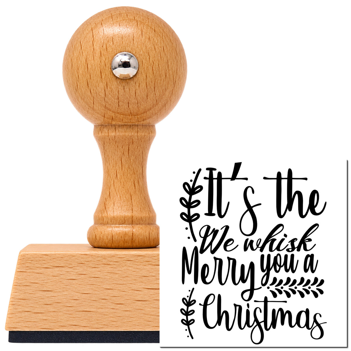 Vintage Pro beech wood stamp with a round knob handle, shown with its black We Whisk Merry Christmas Botanical Sprig imprint on white.