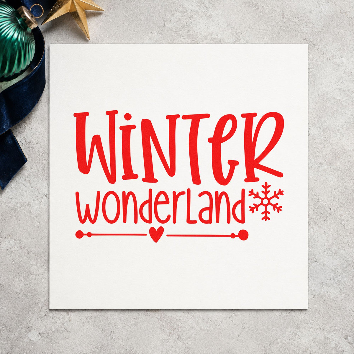 Winter Wonderland Snowflake craft stamp in red ink on cardstock, an easy option for cuff edge printing.