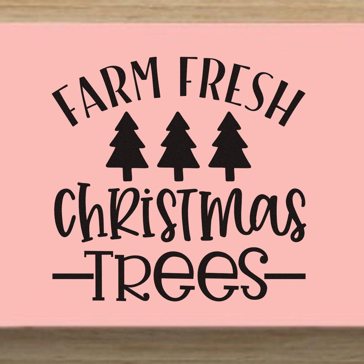 Farm Fresh Christmas Trees rubber stamp on pink background with black text and three pine tree icons.