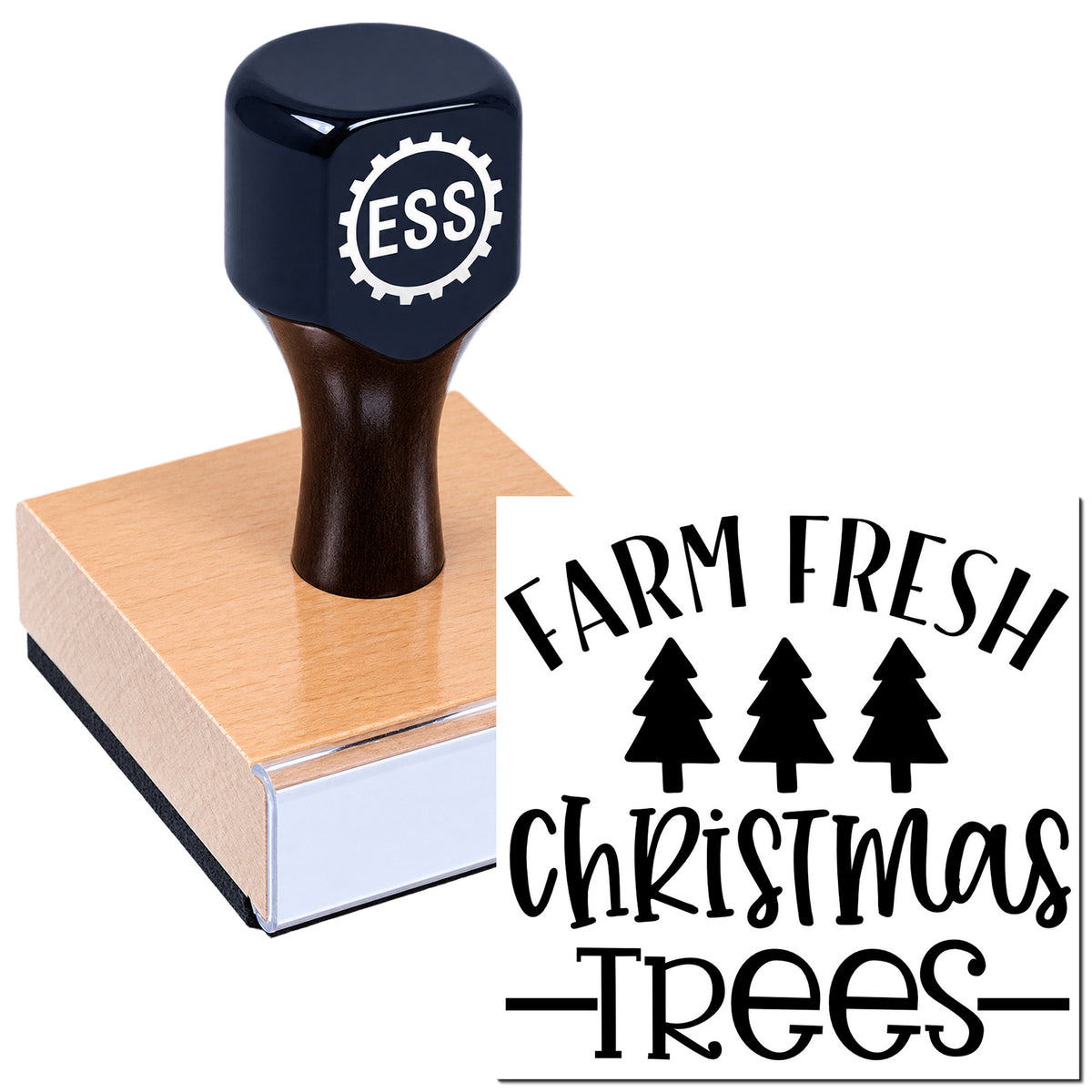 Navy-black ESS stamp on a wooden block, imprinting a black "Farm Fresh Christmas Trees" seal with three pine trees.