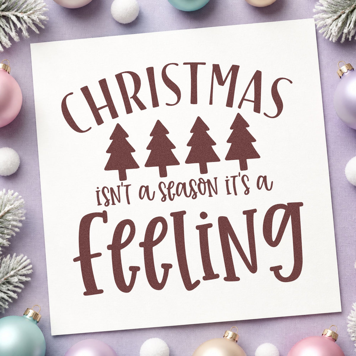 Christmas Is A Feeling rubber stamp printed in brown ink, ready for reflection note sheet and similar paper crafts.