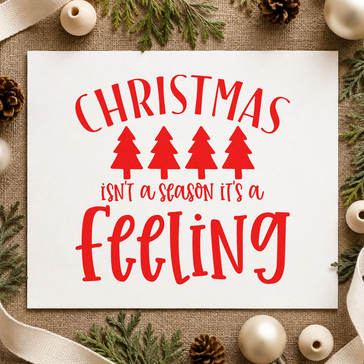 Christmas Is A Feeling craft stamp in red ink on cardstock, an easy option for runner repeat printing.