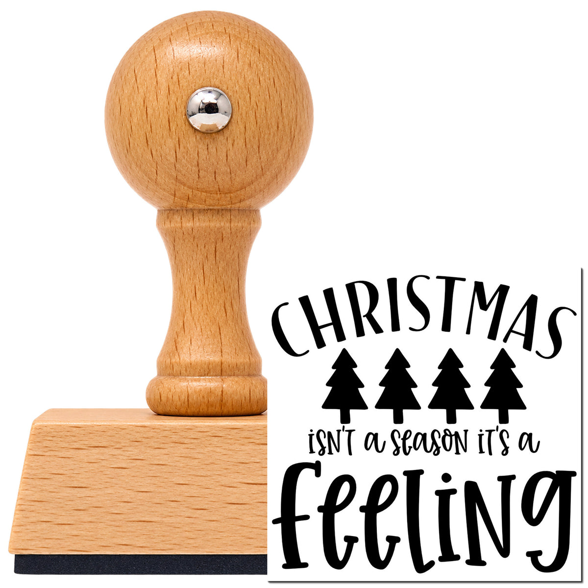 Vintage Pro beech wood stamp with a round knob handle, shown with its black Christmas Is A Feeling imprint on white.