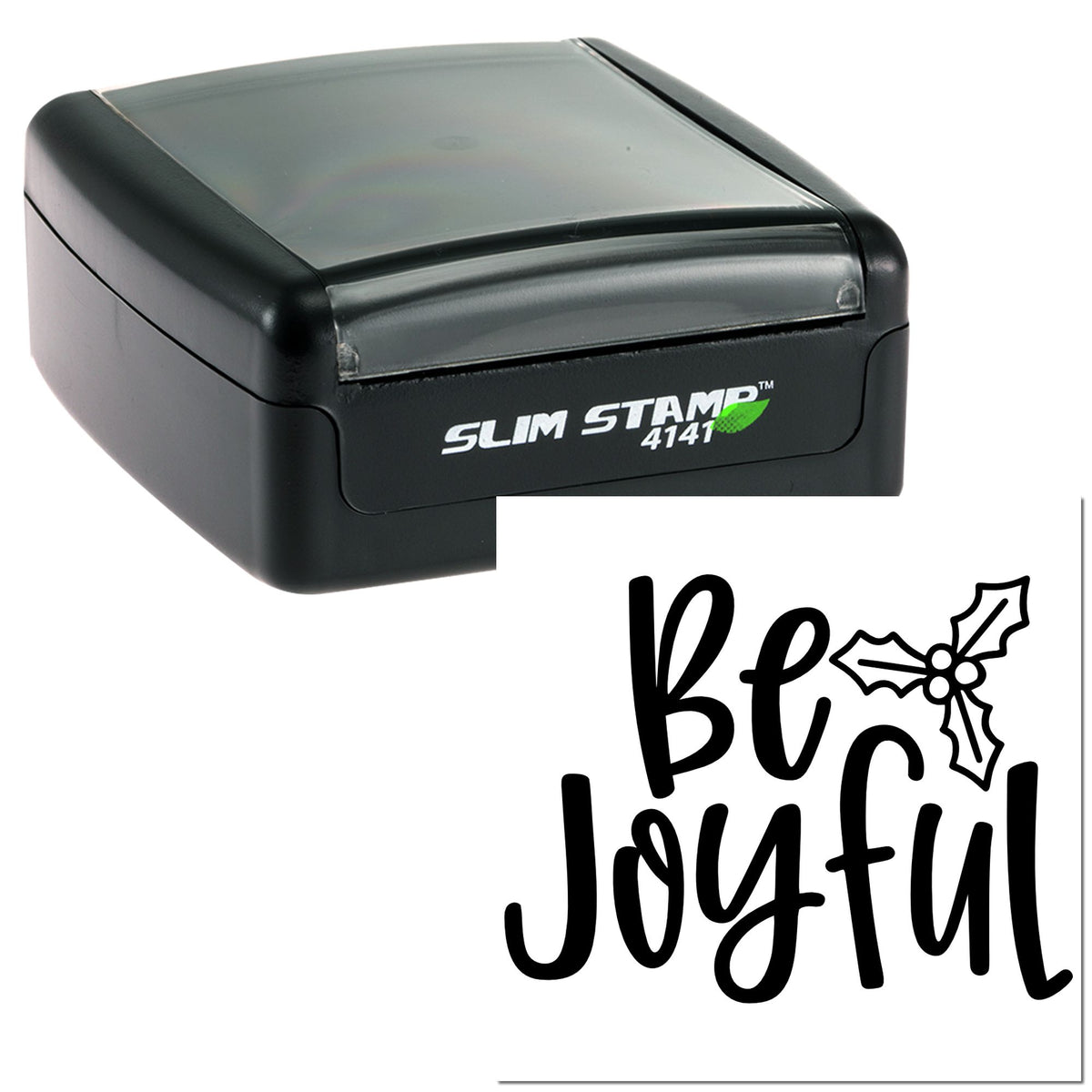 Black Slim Stamp 4141 self-inking stamp with clear top and a black Be Joyful seal design with holly.