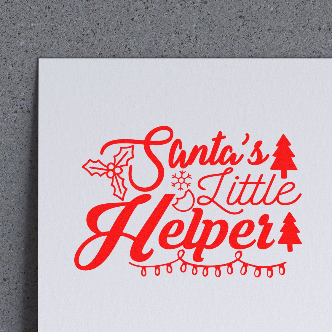 Red Santas Little Helper holiday stamp and seal design on white paper with holly, snowflake, Christmas trees and lights.