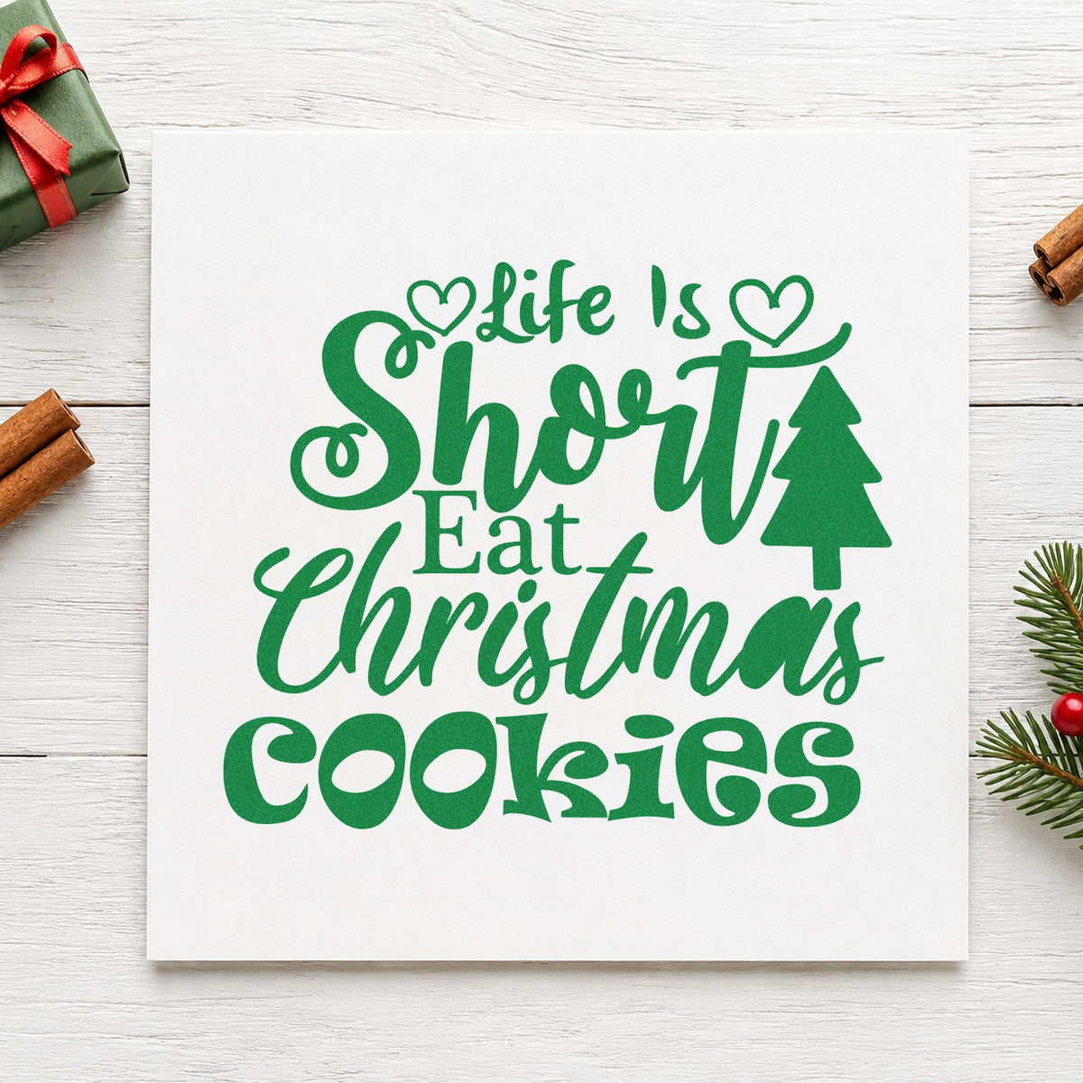 Life Short Eat Christmas Cookies craft stamp imprint in green ink on a handmade project, one idea being tin lid gift tags.
