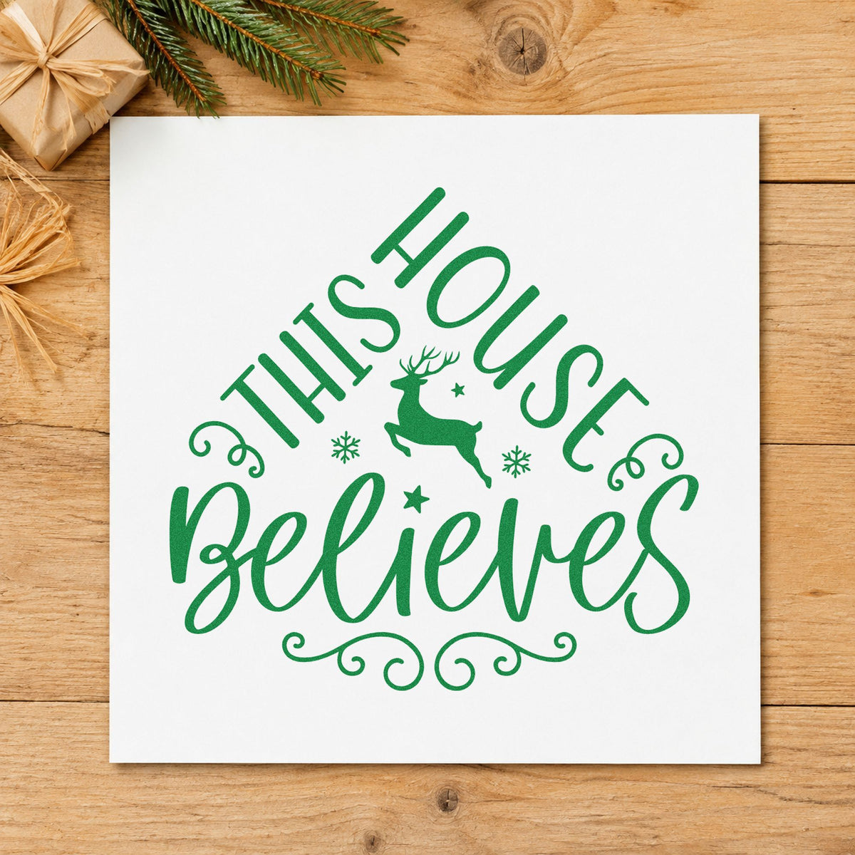 This House Believes Reindeer craft stamp imprint in green ink on a handmade project, one idea being door hanger tags.
