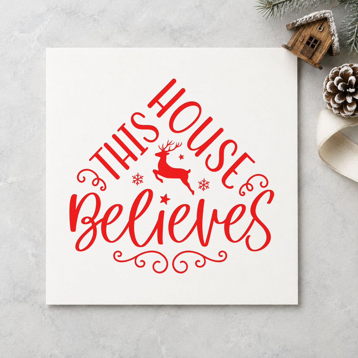 This House Believes Reindeer rubber stamp shown in red ink, stamped for projects such as storage room labels.
