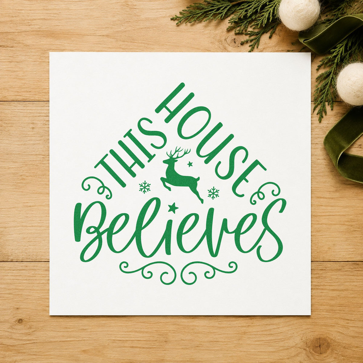 This House Believes Reindeer craft stamp imprint in green ink on a handmade project, one idea being neighbor note cards.