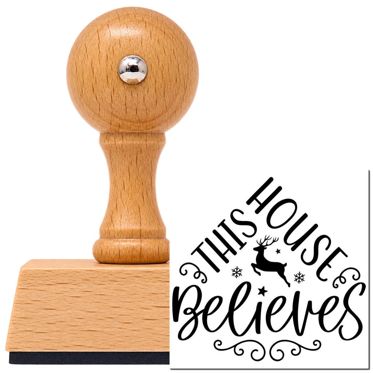 Vintage Pro beech wood stamp with a round knob handle, shown with its black This House Believes Reindeer imprint on white.