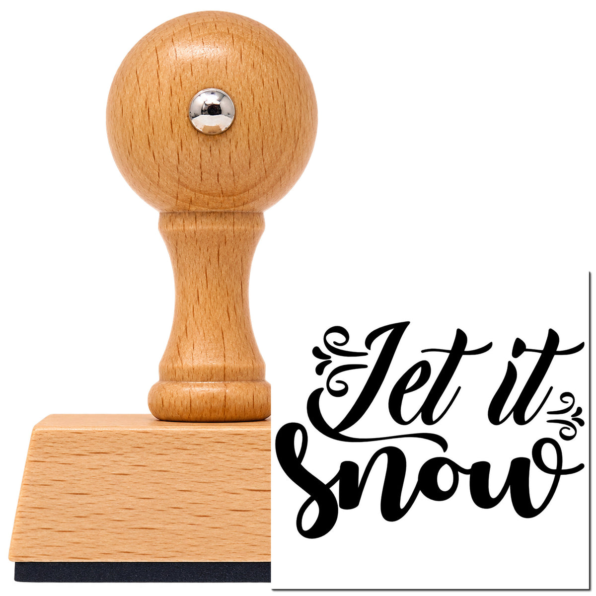Vintage Pro beech wood stamp with a round knob handle, shown with its black Let It Snow Decorative Script Lettering imprint on white.