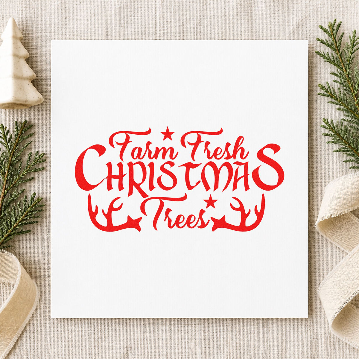 Farm Fresh Christmas Trees Antlers craft stamp in red ink on cardstock, an easy option for saddle pad printing.