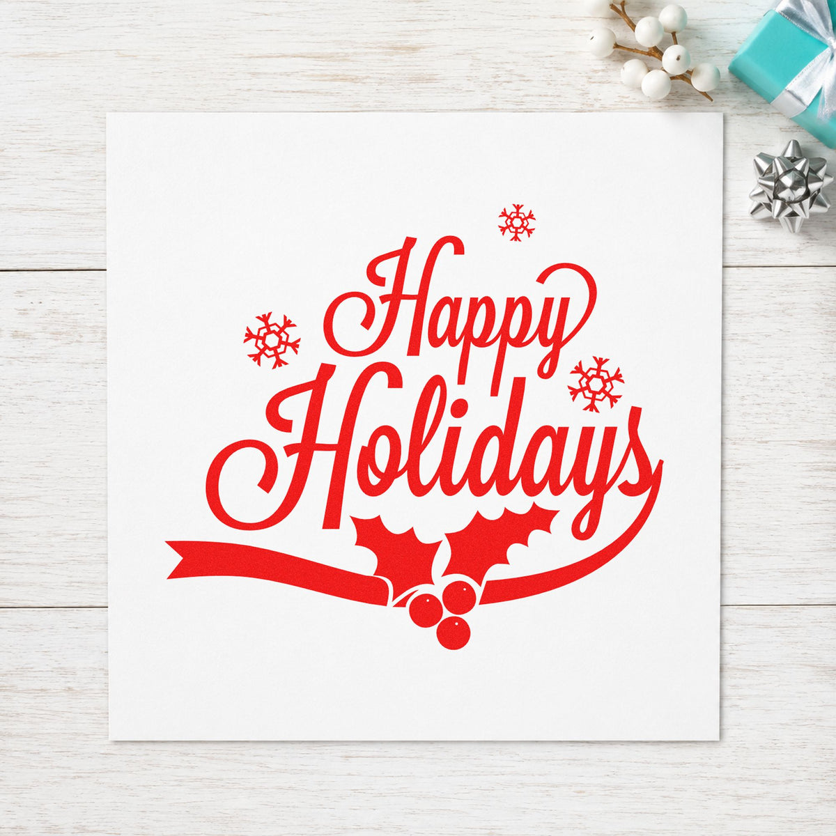Happy Holidays Holly Ribbon rubber stamp shown in red ink, stamped for projects such as spool end labels.