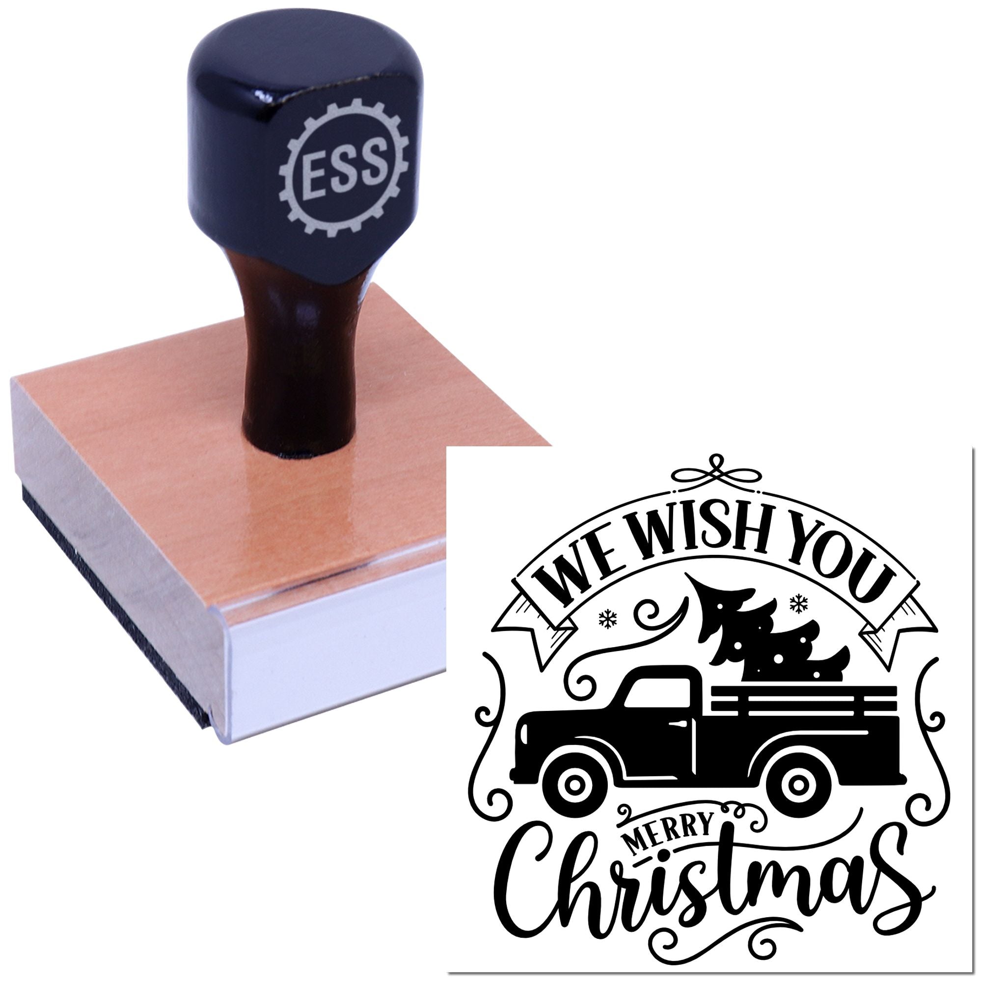 Black ESS stamp and seal on wooden block, with a Merry Christmas truck design and We Wish You holiday text.