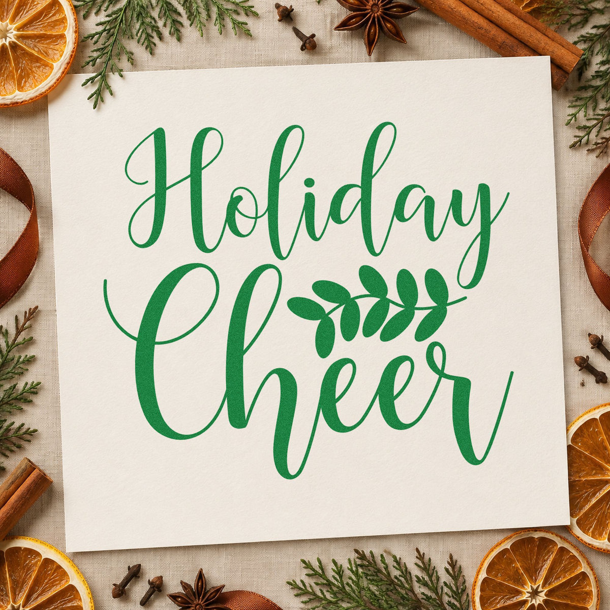 Holiday Cheer Leafy Sprig craft stamp imprint in green ink on a handmade project, one idea being robe bundle tags.
