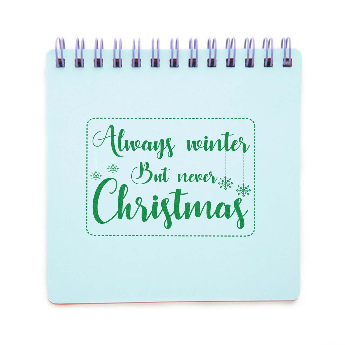 Light blue stamp and seal notebook with green Always winter But never Christmas script and hanging snowflakes