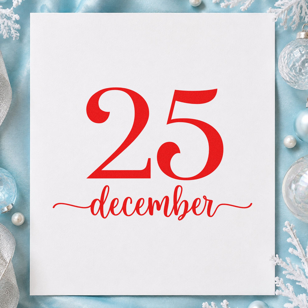 December Twenty Five rubber stamp shown in red ink, stamped for projects such as archive year labels.