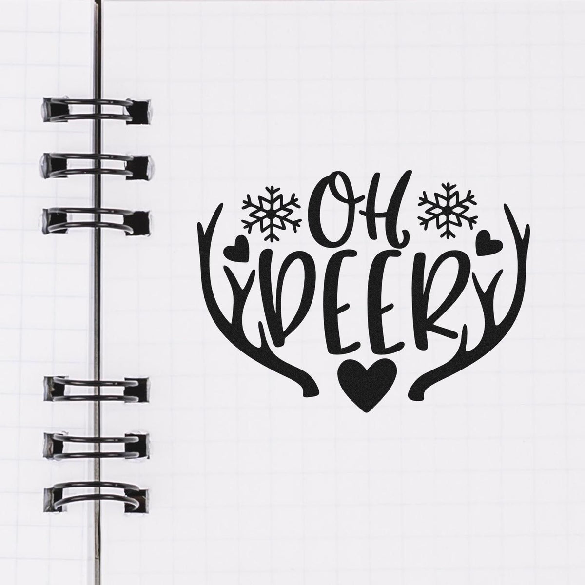 Oh Deer Antlers Snowflakes With Hearts Stamp - Premium Vintage Pro Wooden imprint stamped in black ink. "Oh Deer" is framed by antlers with snowflakes and hearts.