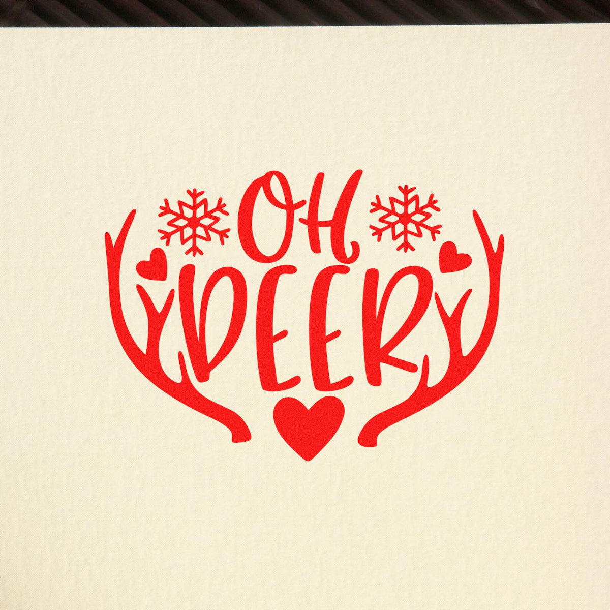 Oh Deer Antlers Snowflakes rubber stamp shown in red ink, stamped for projects such as nursery album page.