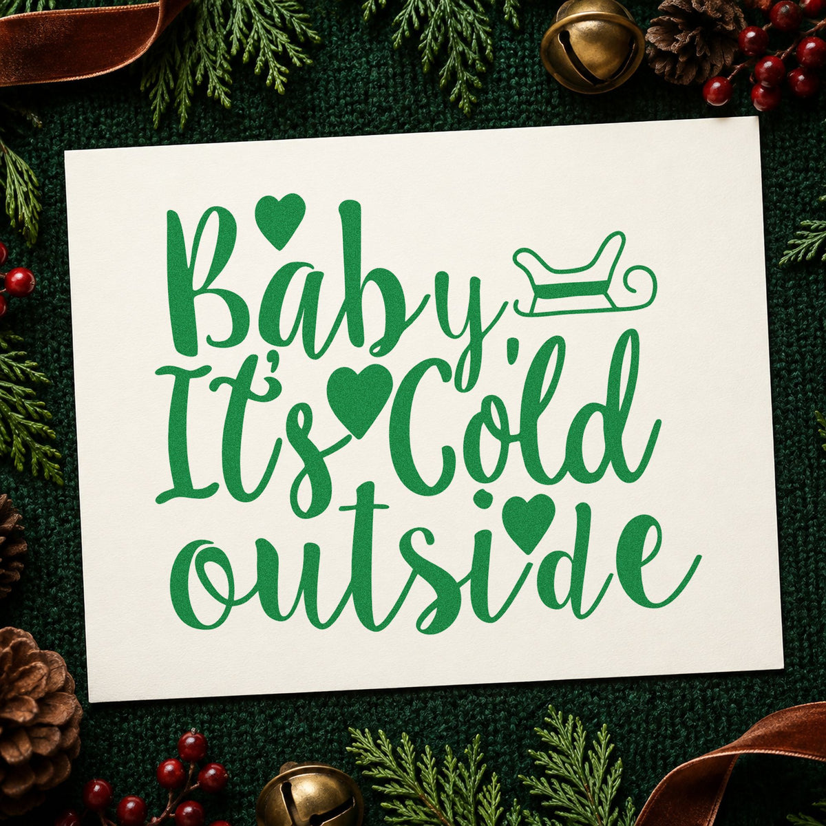 Baby It's Cold Outside Sleigh craft stamp imprint in green ink on a handmade project, one idea being ride ticket tags.
