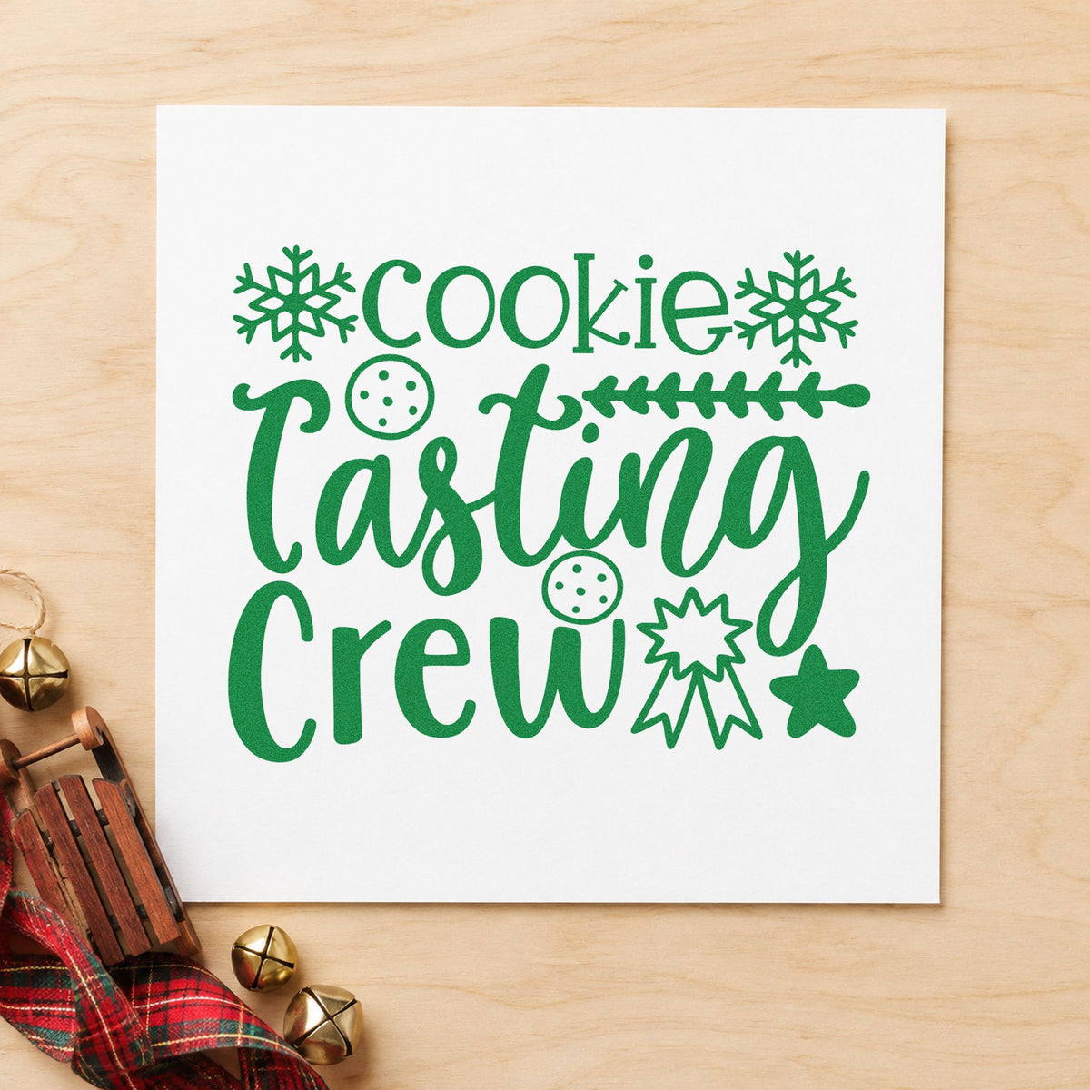 Cookie Tasting Crew craft stamp imprinted in green ink on paper, a design suited to framed tasting table.