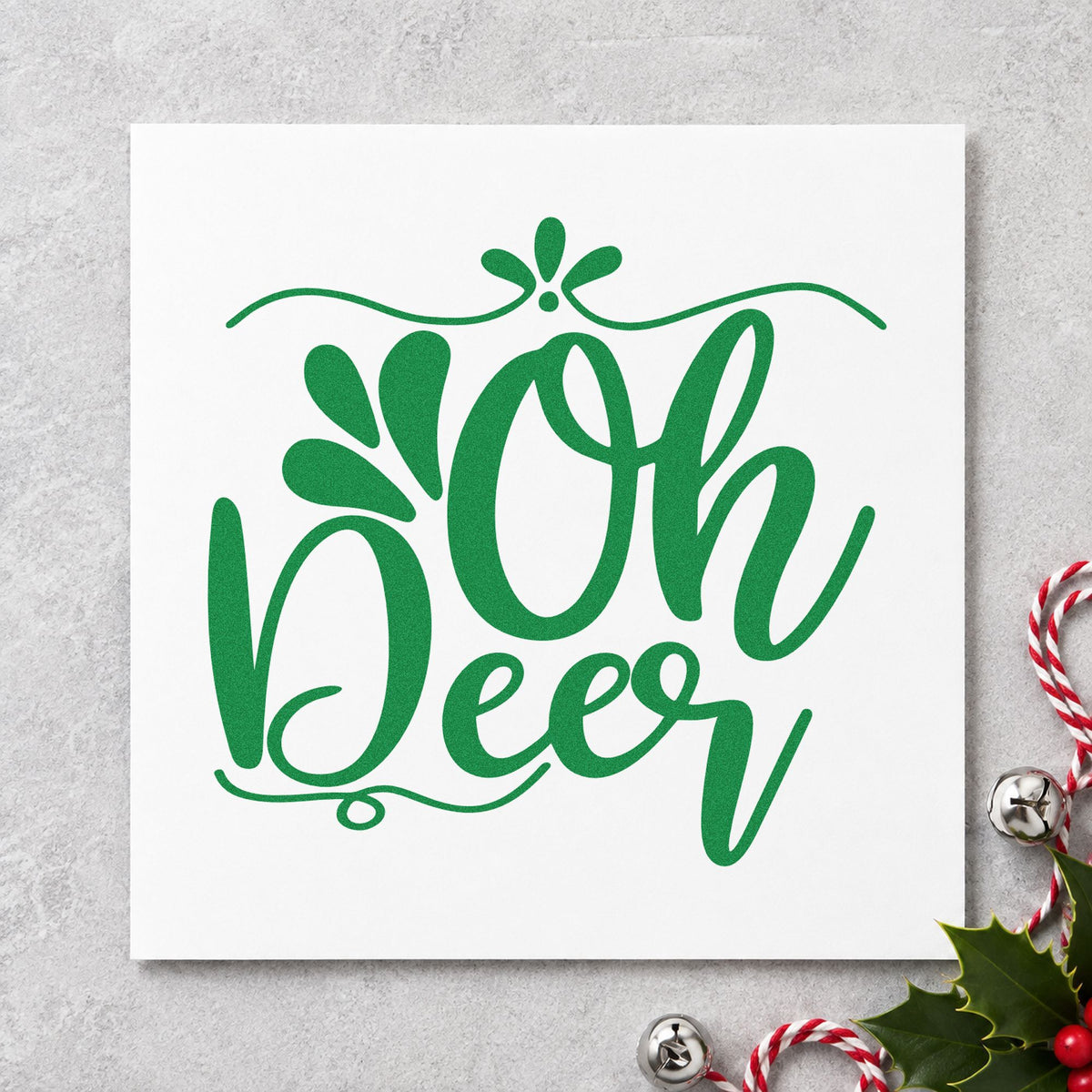 Oh Deer Ornamental Script craft stamp imprinted in green ink on paper, a design suited to framed statement wall.