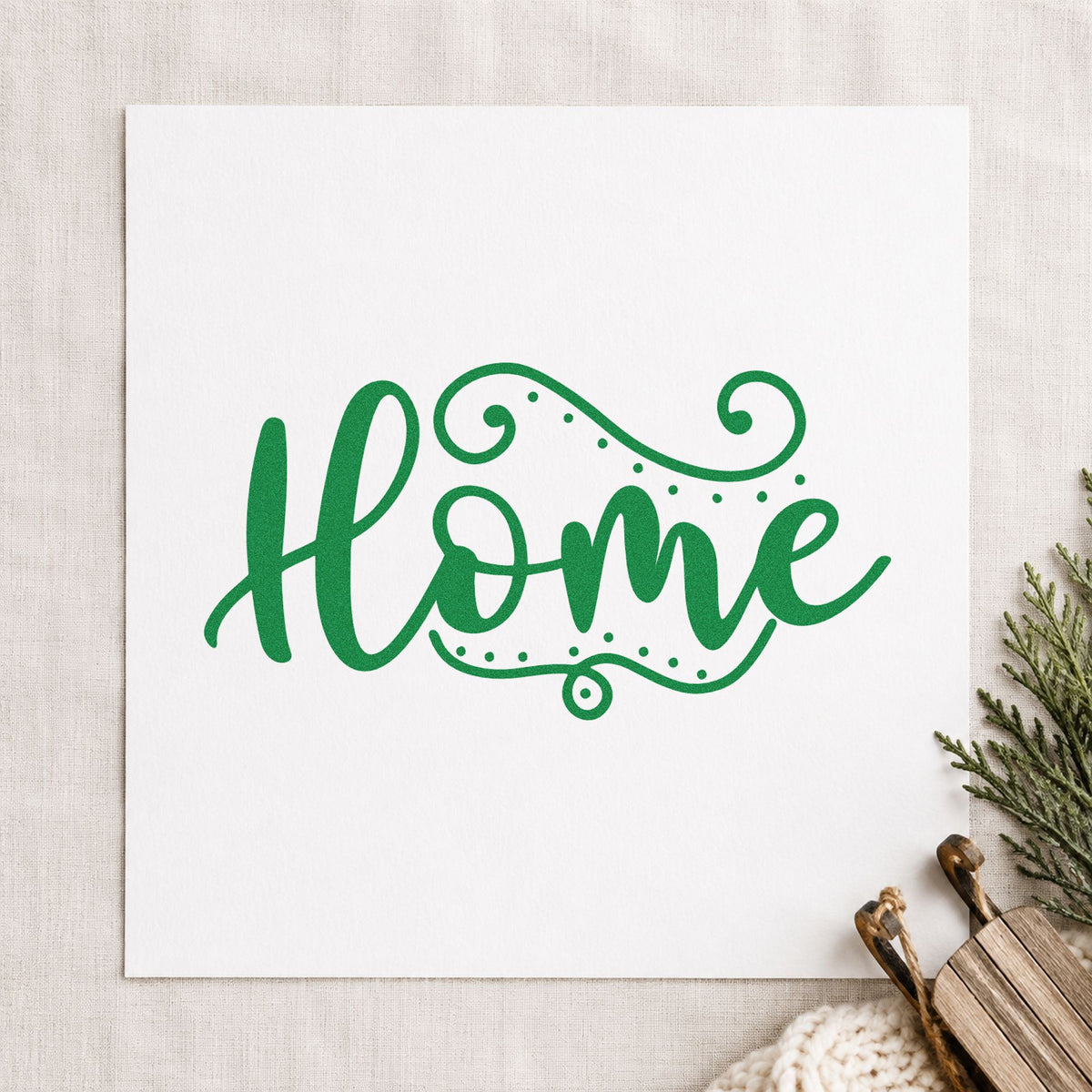 Home Flourishing Script craft stamp imprinted in green ink on paper, a design suited to framed entry ledge.