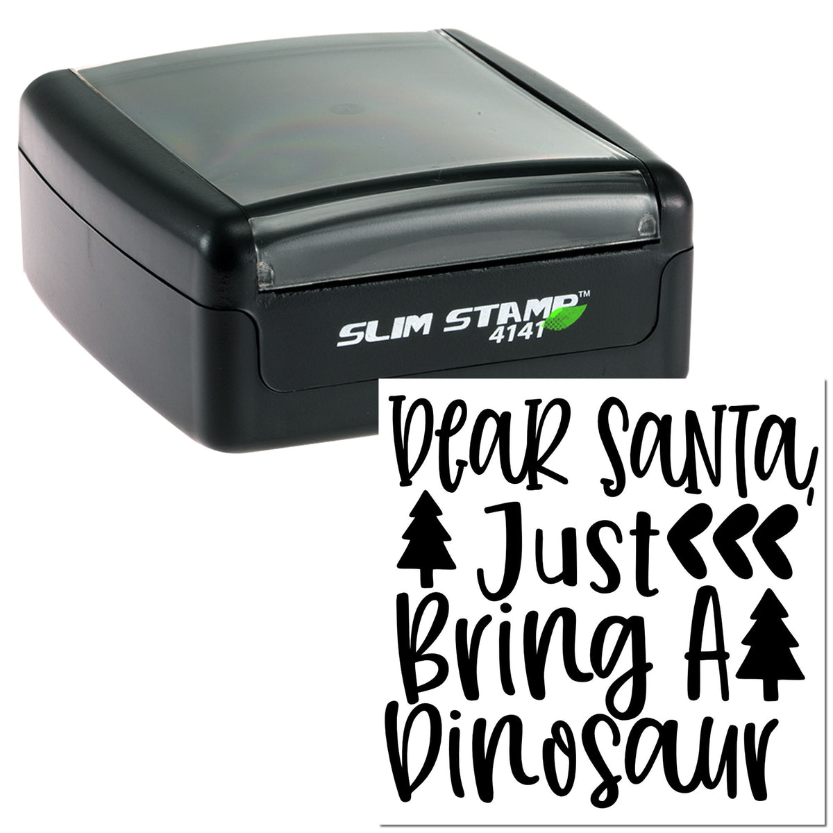 Black self-inking stamp with clear lid, showing Dear Santa, Just Bring a Dinosaur in bold black script and tree icons.