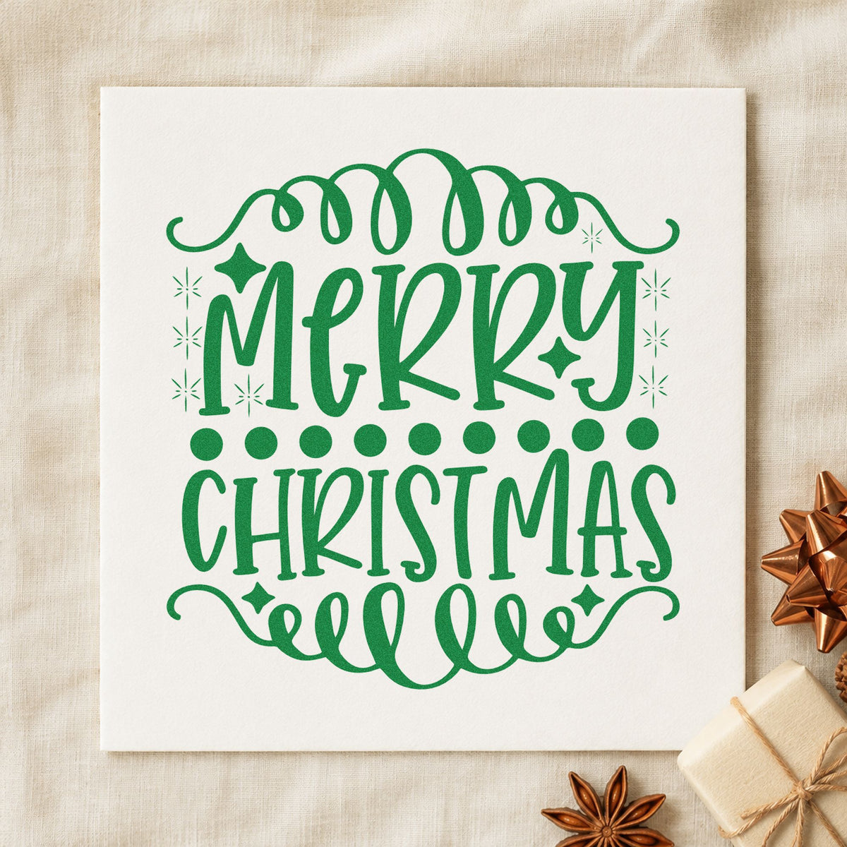 Merry Christmas Loop Borders craft stamp imprint in green ink on a handmade project, one idea being tea menu slips.