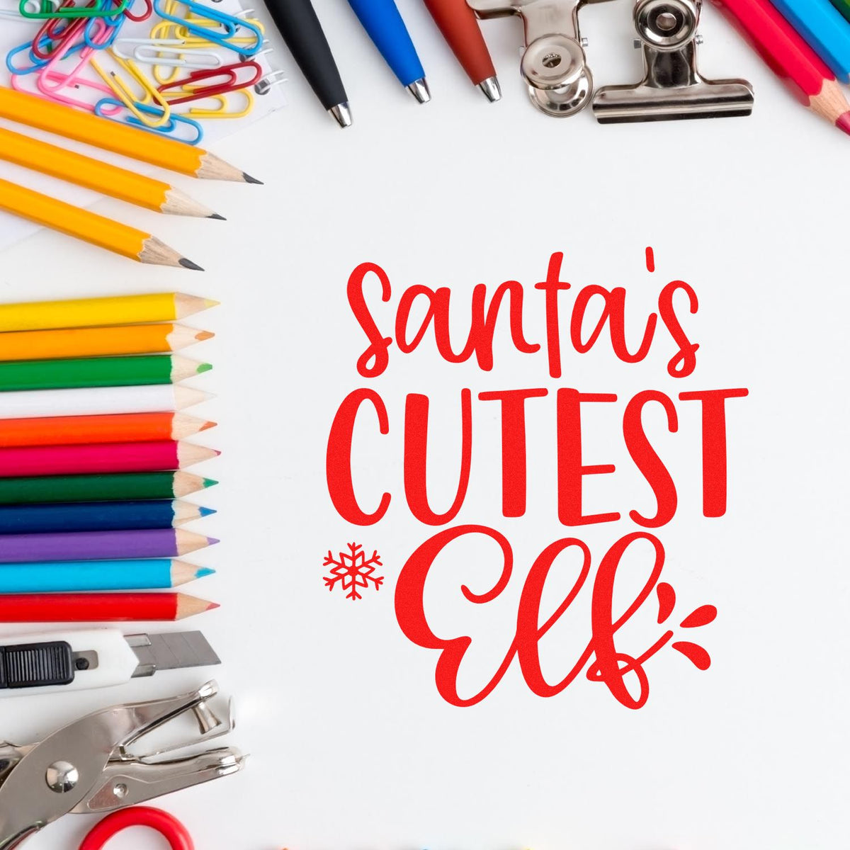 Red Santas Cutest Elf stamp/seal design with colorful pencils, binder clips, paper clips, and craft tools.