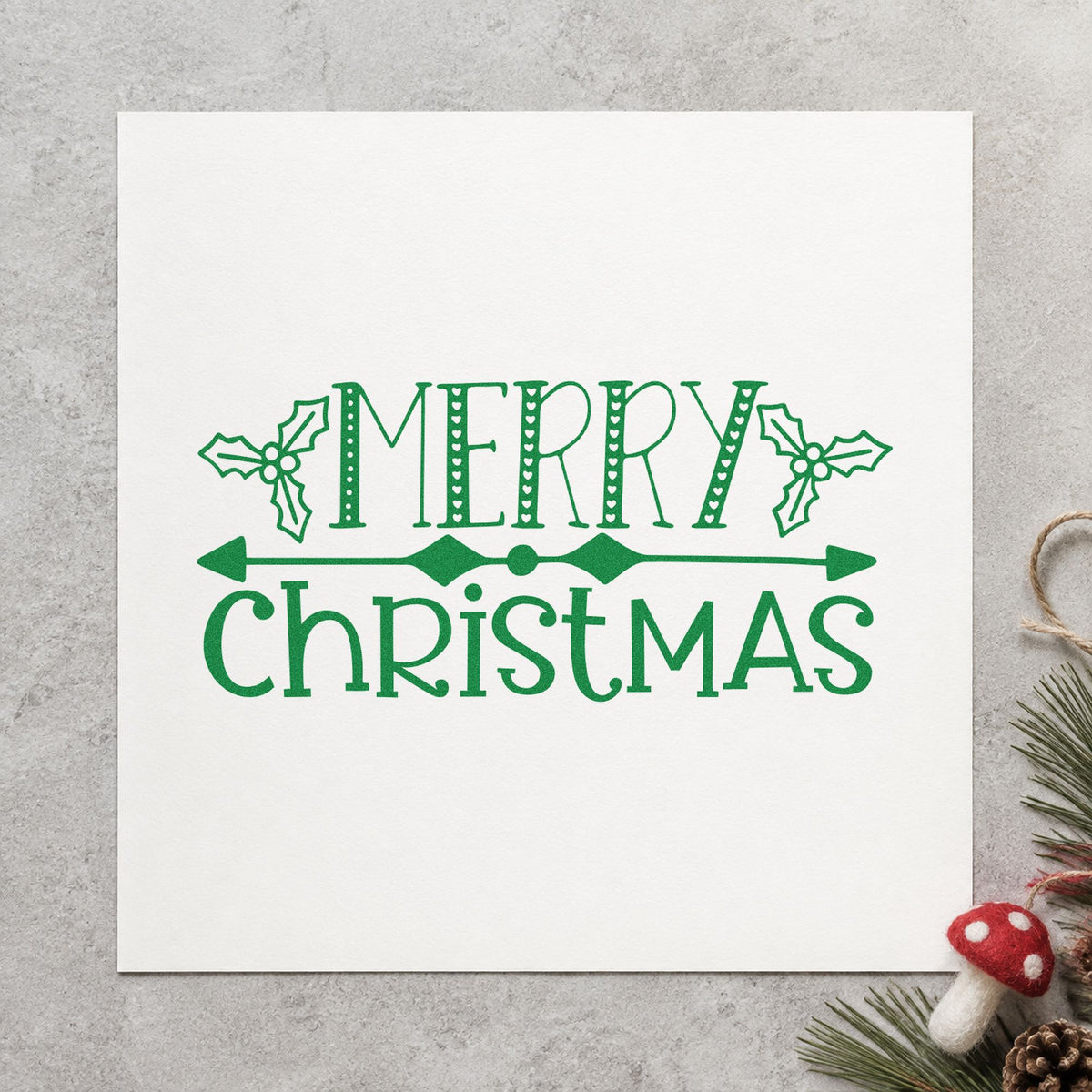 Merry Christmas Holly Banner craft stamp imprinted in green ink on paper, a design suited to framed long panel.