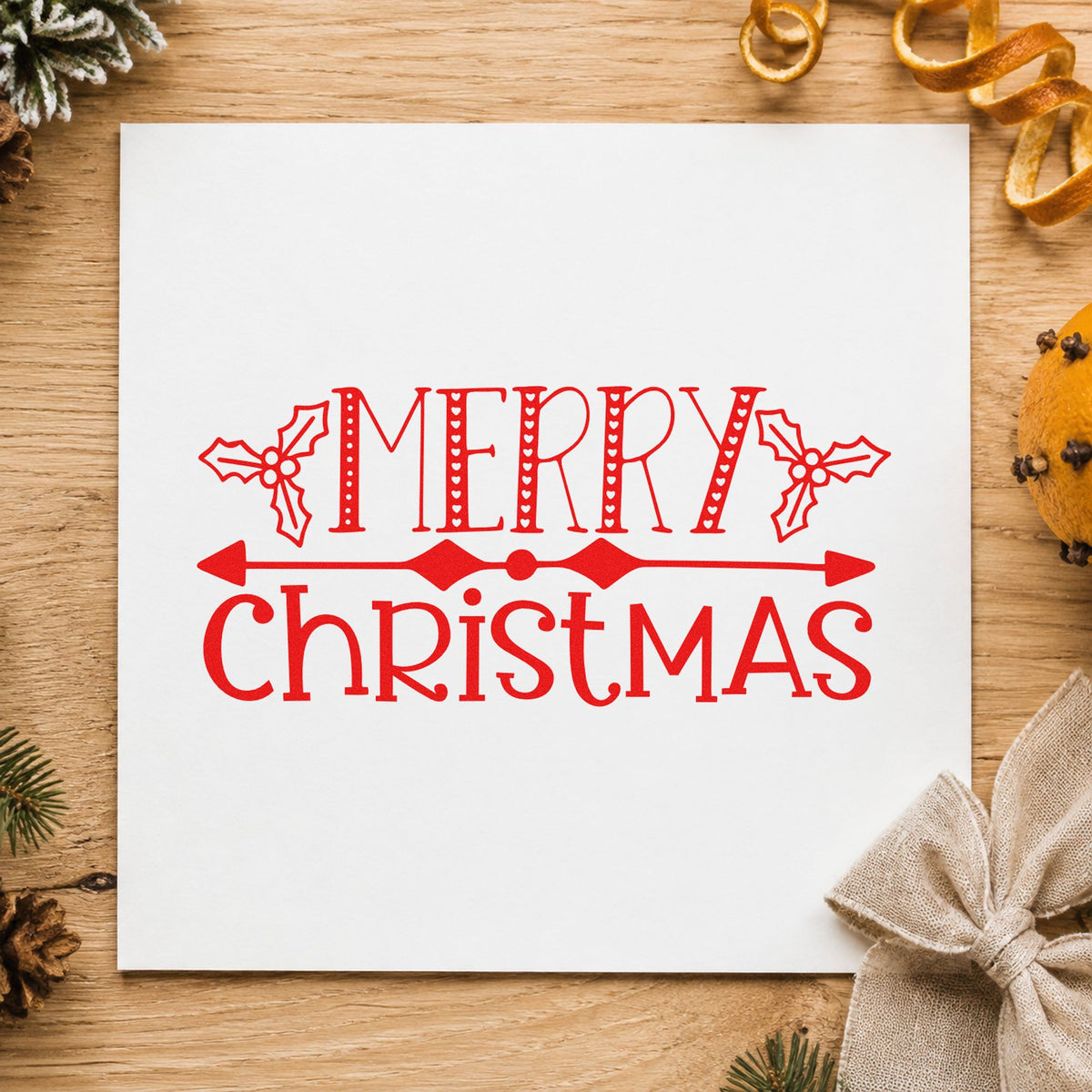 Merry Christmas Holly Banner rubber stamp shown in red ink, stamped for projects such as shelf strip labels.