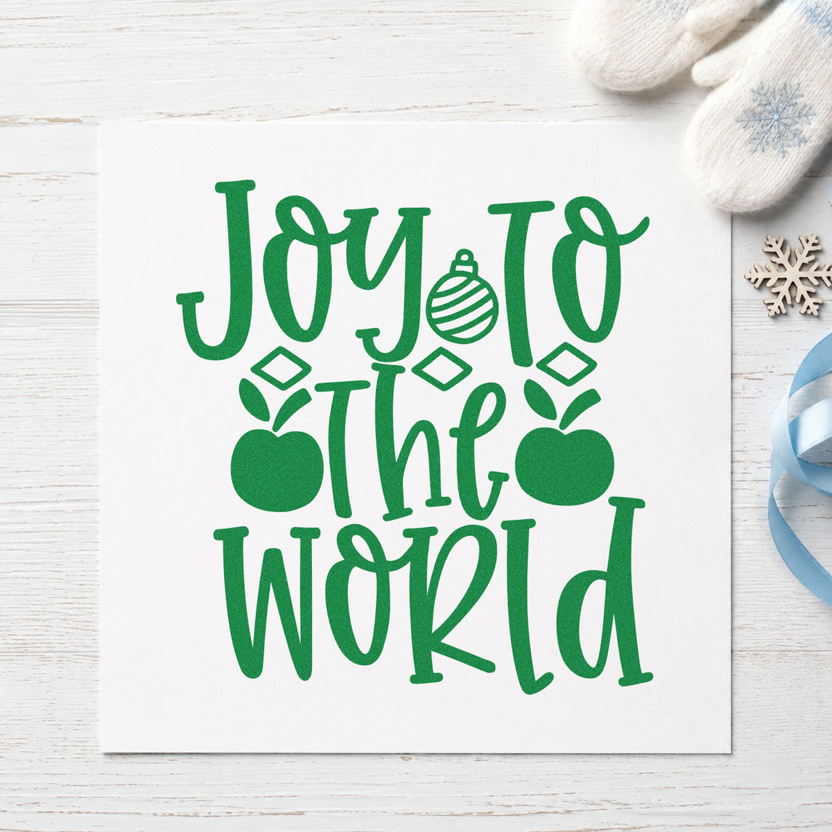 Joy To The World Ornaments craft stamp imprint in green ink on a handmade project, one idea being hook loop gift tags.