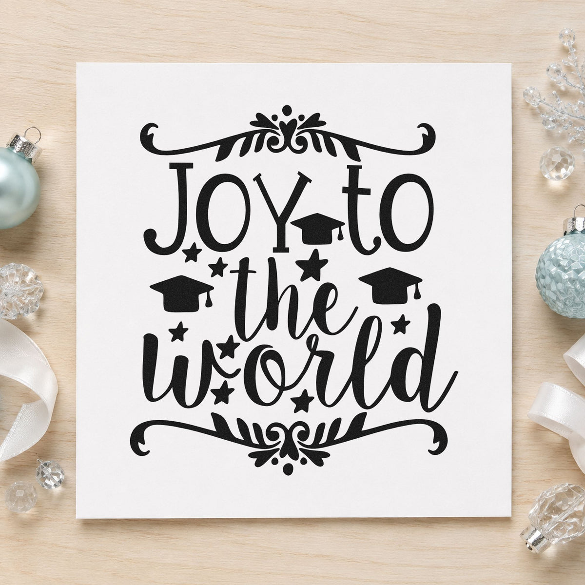Joy To The World Flourishes rubber stamp printed in black ink, ready for grad cap cards and similar paper crafts.