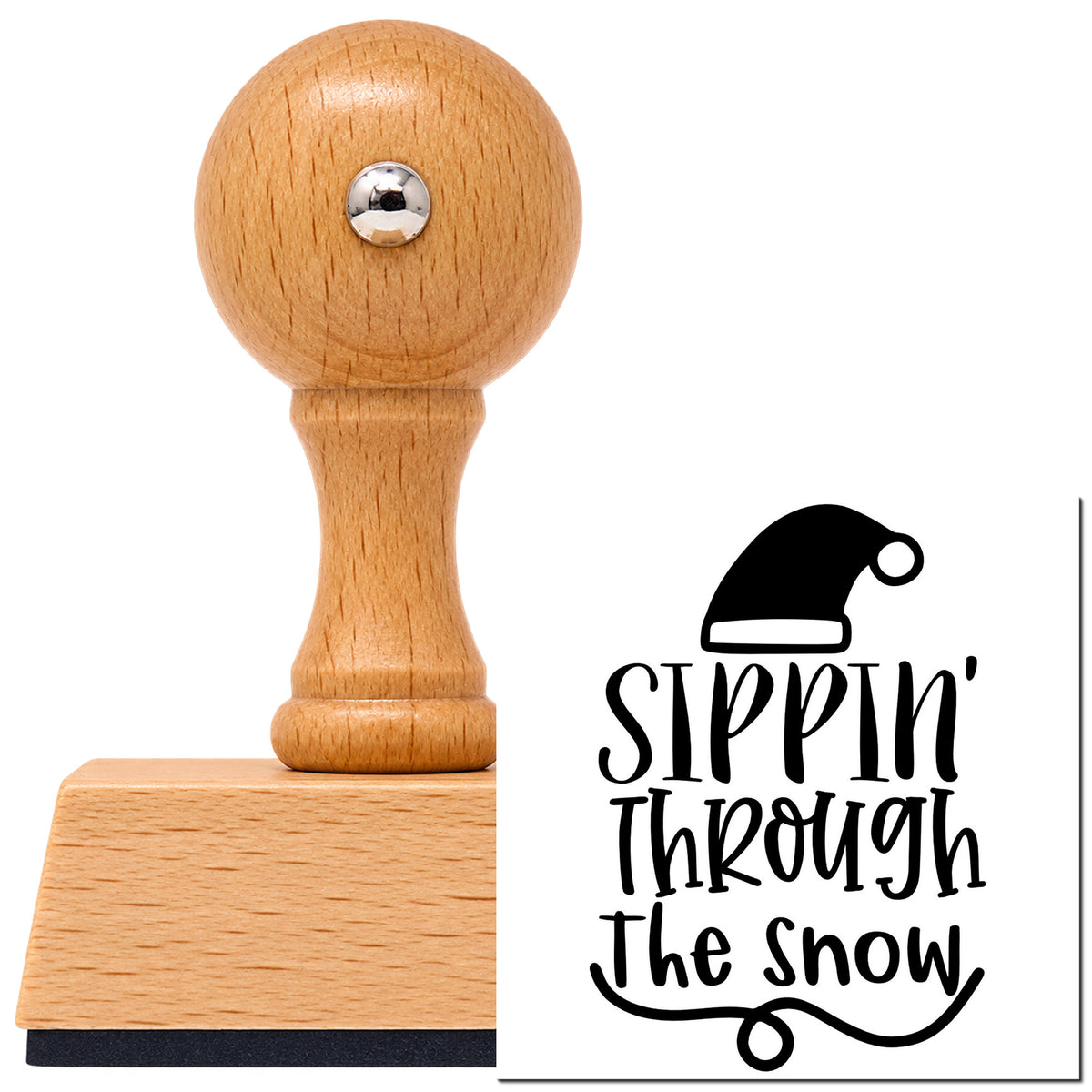 Vintage Pro beech wood stamp with a round knob handle, shown with its black Sippin Through The Snow imprint on white.