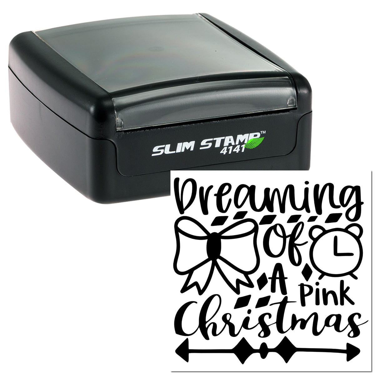 Black slim self-inking stamp with gray lid and custom seal reading Dreaming of a Pink Christmas in bold script with bow and ornament.