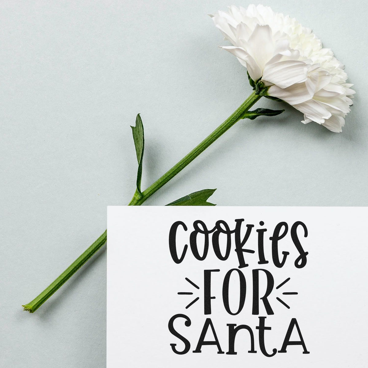 Cookies for Santa stamp and seal card with white flower on pale gray background