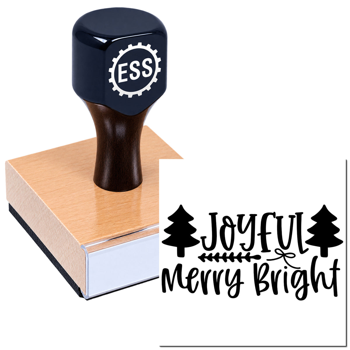 Dark navy ESS custom stamp on wood block, with black "Joyful Merry Bright" holiday seal and pine tree design.