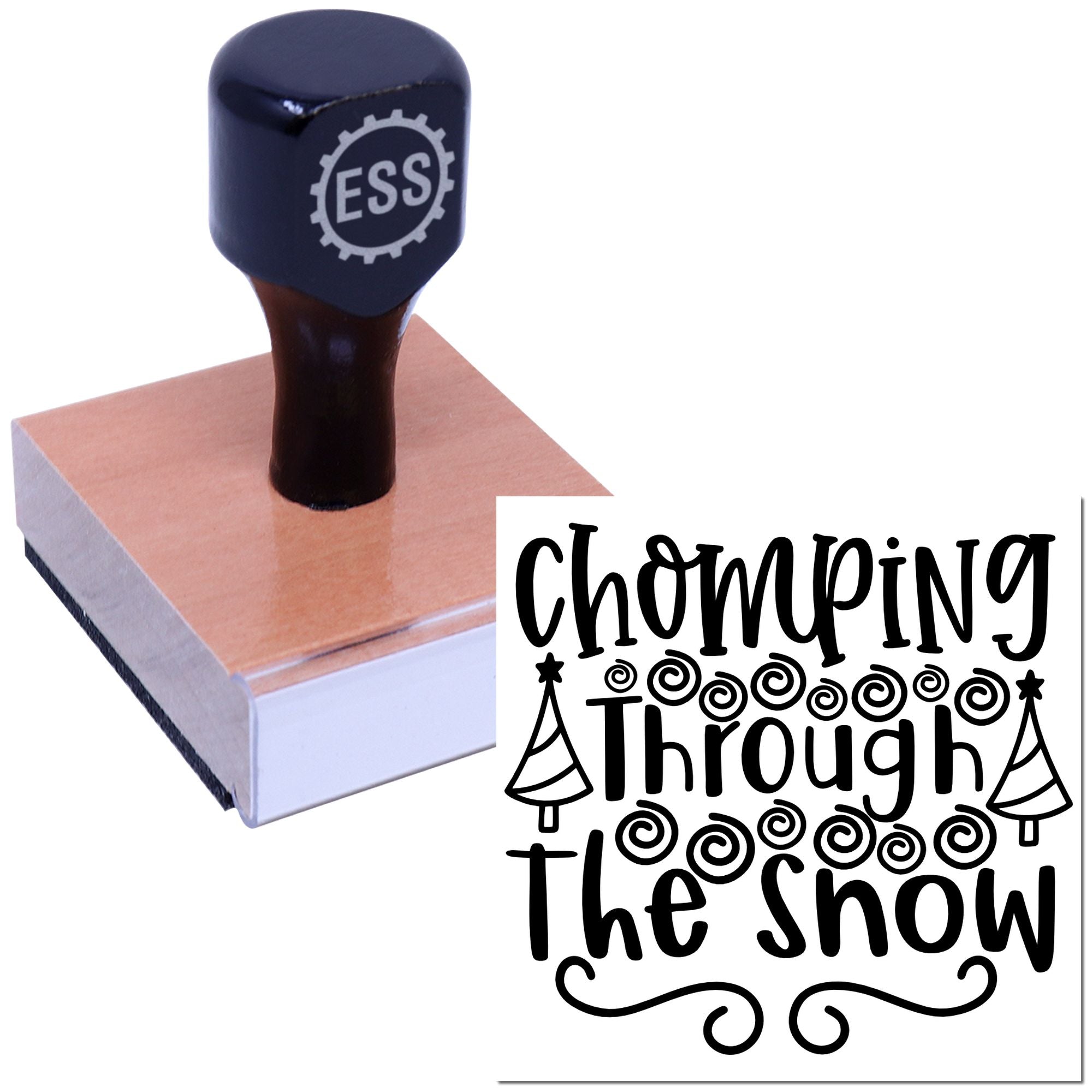 Dark navy ESS rubber stamp on a wooden block with black decorative seal reading Chomping Through the Show