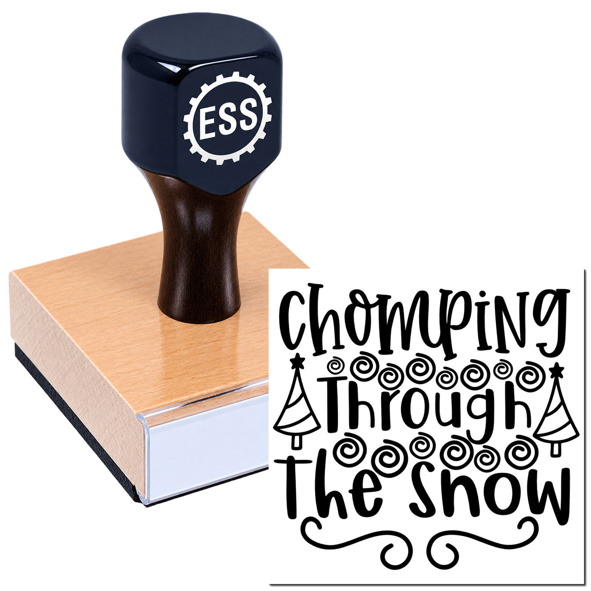 Dark navy ESS rubber stamp on a wooden block with black decorative seal reading "Chomping Through the Show"