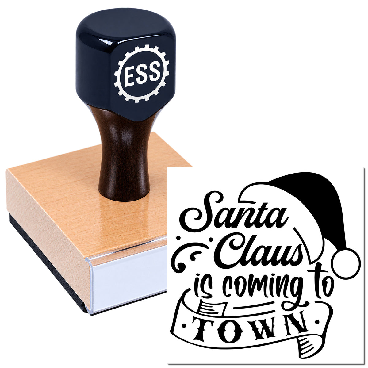 Dark blue ESS custom stamp on wooden block beside black Santa Claus is coming to town seal design.