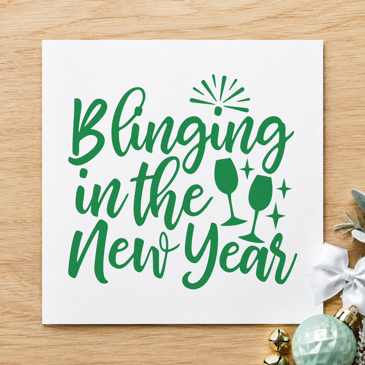 Blinging In The New Year craft stamp imprint in green ink on a handmade project, one idea being gala table cards.