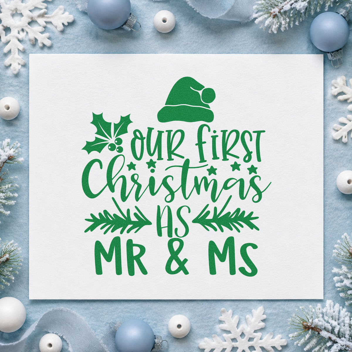 Our First Christmas Mr and Ms craft stamp imprinted in green ink on paper, a design suited to framed shared mantel.