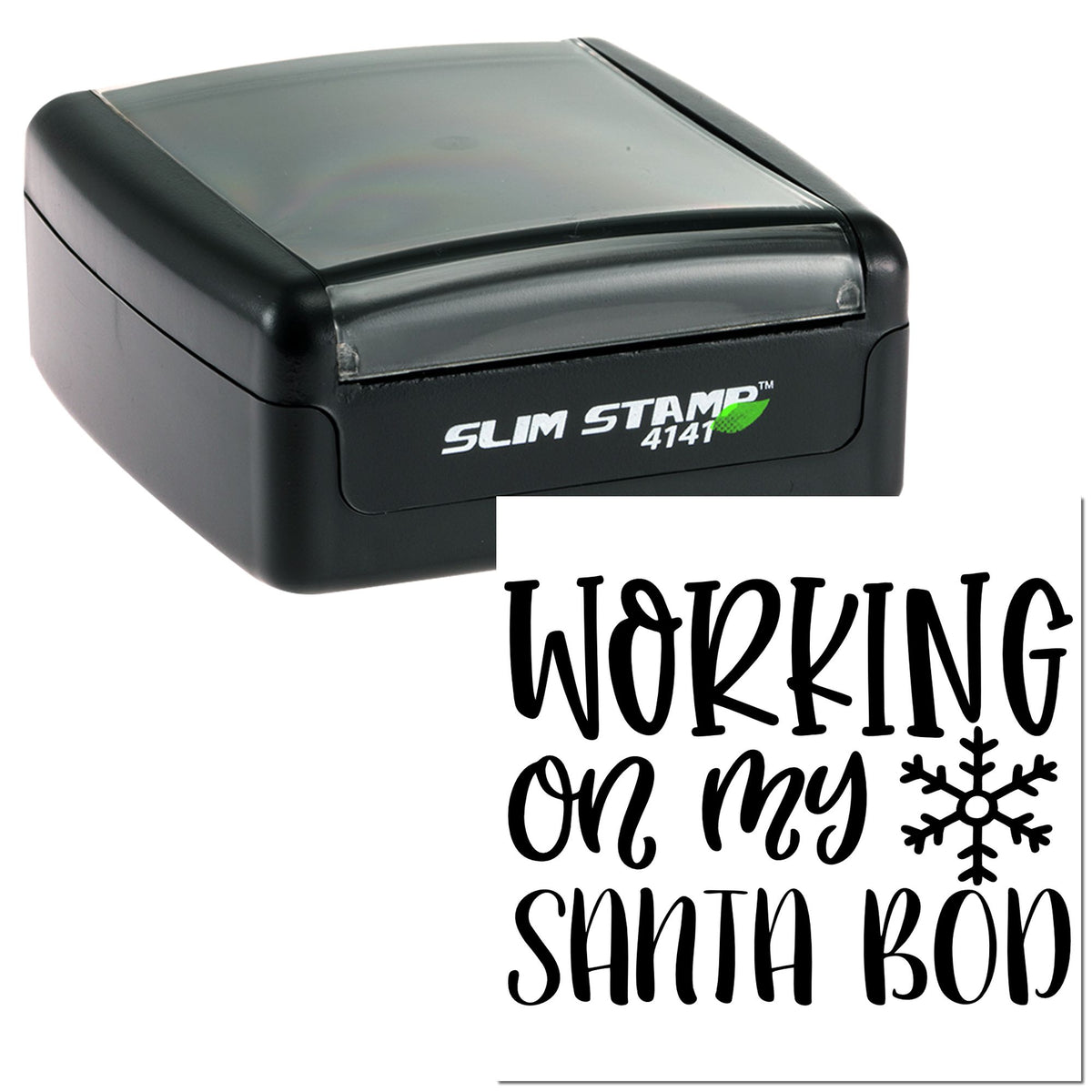 Black self-inking Slim Stamp 4141 with clear top; white stamped design reads Working on my Santa bod with a snowflake.