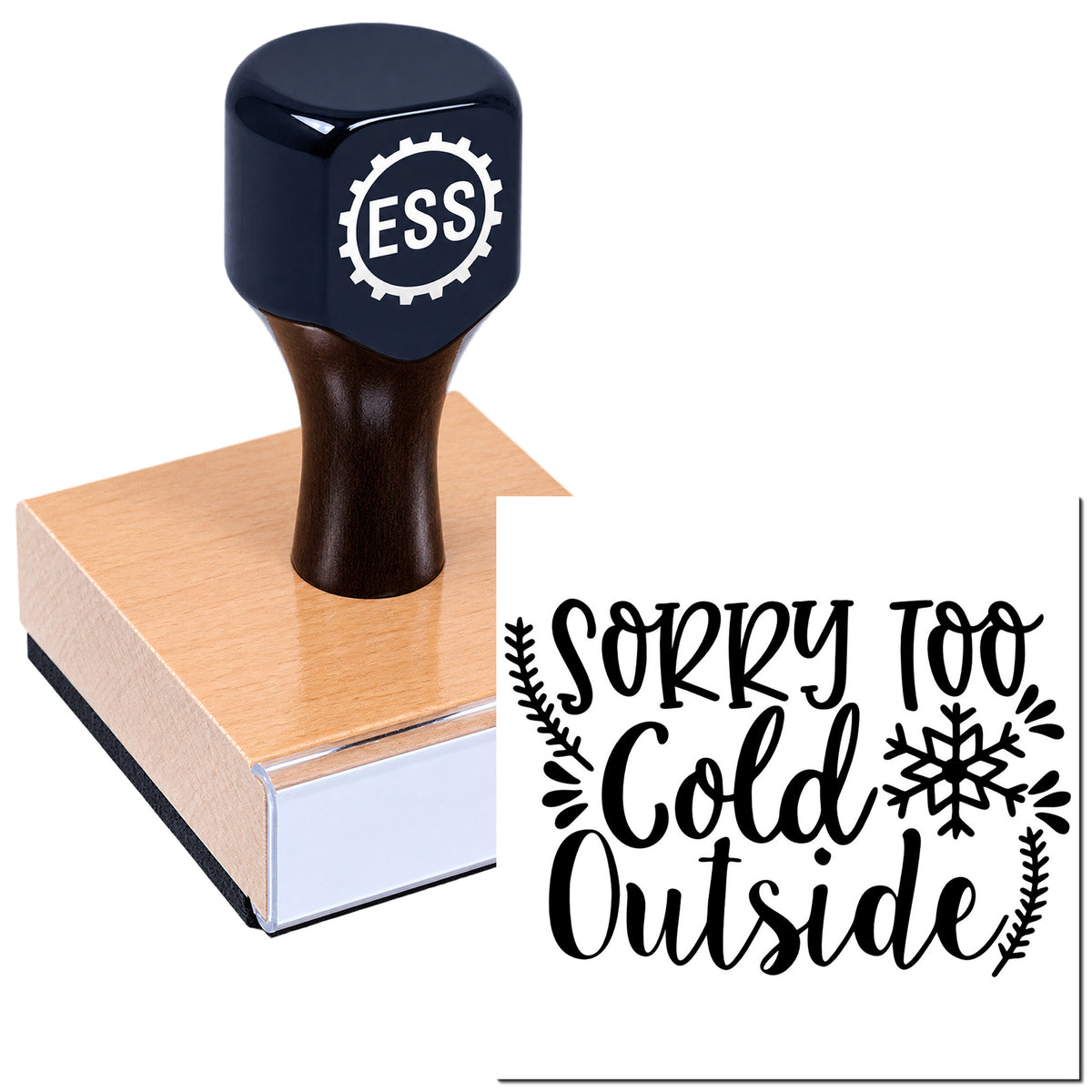 Black ESS rubber stamp on wooden base beside a bold black "Sorry Too Cold Outside" seal with snowflakes on white background.
